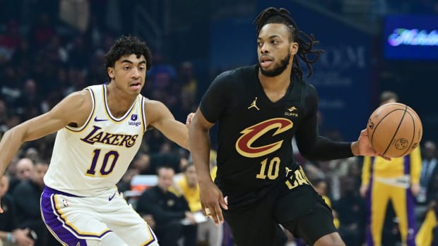 Nov 25, 2023; Cleveland, Ohio, USA; Cleveland Cavaliers guard Darius Garland (10) drives to the basket against Los Angeles Lakers guard Max Christie (10) during the first half at Rocket Mortgage FieldHouse. Mandatory Credit: Ken Blaze-USA TODAY Sports
